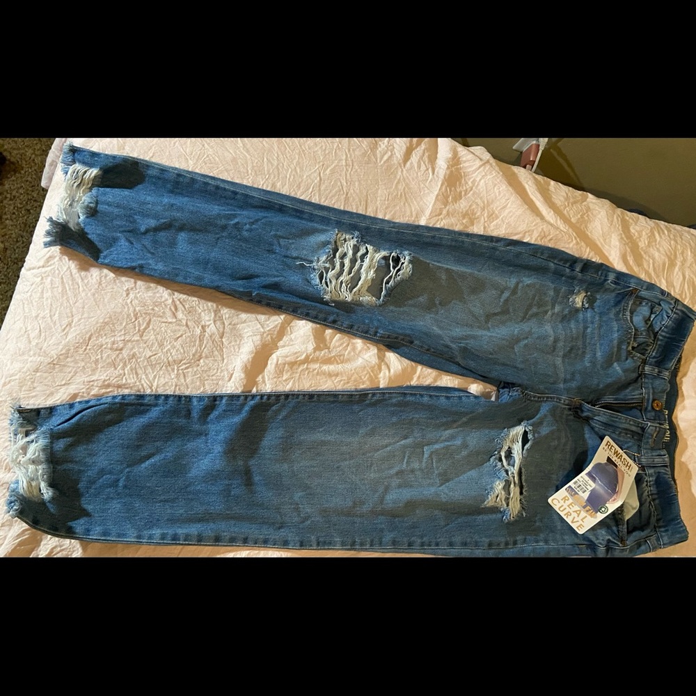 Ripped blue jeans